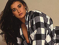 Demi Moore posing braless early photoshoots